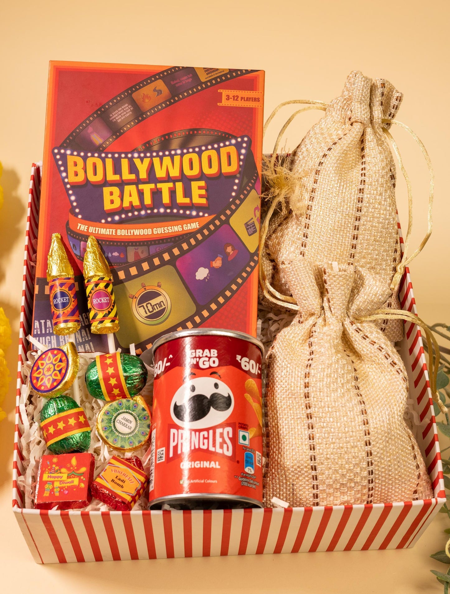 Celebrations Delight Hamper with Nuts, Snacks, Chocolates, and Game