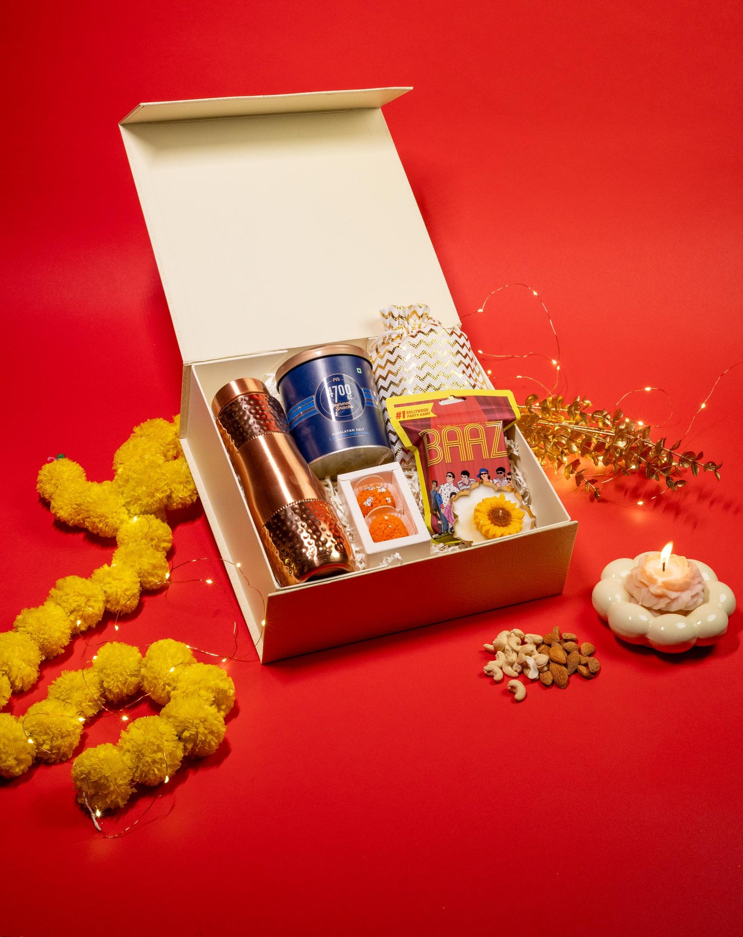 Royal Utsav Hamper with Copper Bottle, Snacks, Candles, and Game