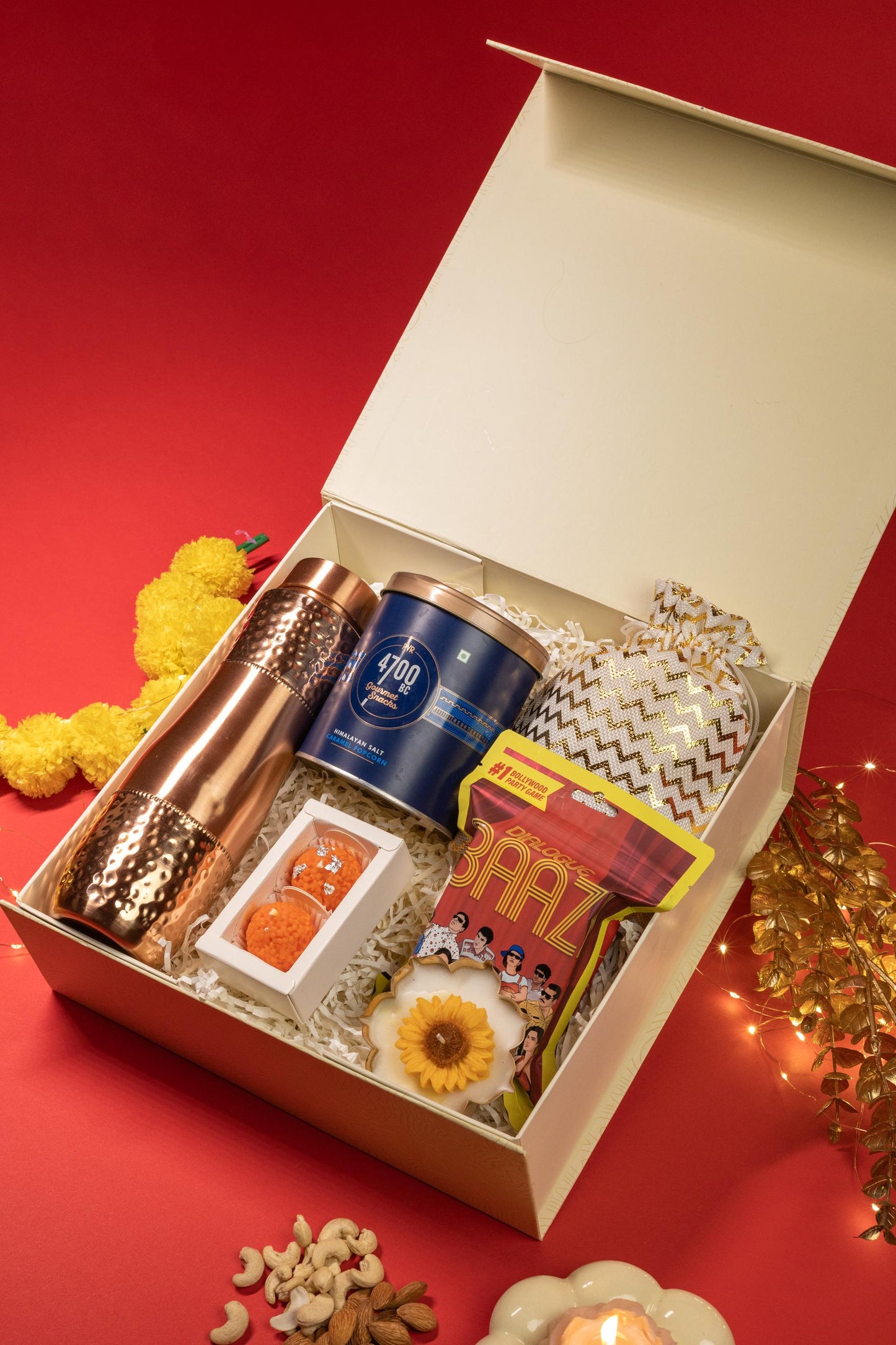 Royal Utsav Hamper with Copper Bottle, Snacks, Candles, and Game