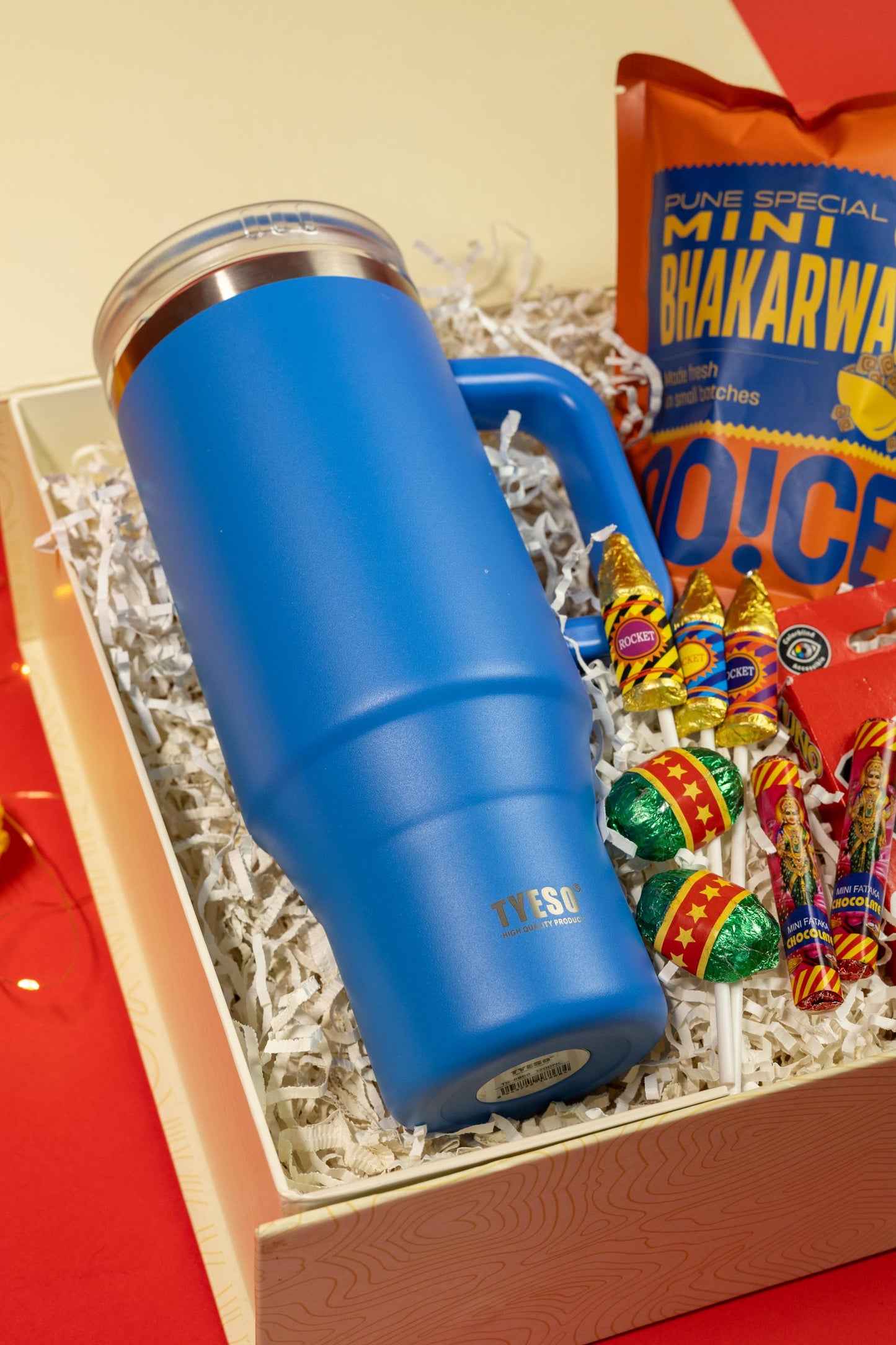 Festive Fusion Hamper with Tumbler, Snacks, Chocolates, and Game