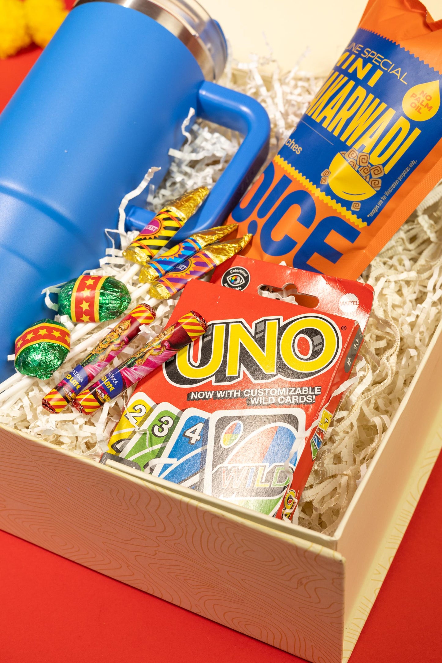 Festive Fusion Hamper with Tumbler, Snacks, Chocolates, and Game